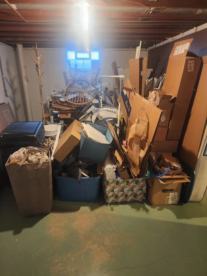 Roll-off dumpster container at job site for Construction Dumpster Rental in Hebron